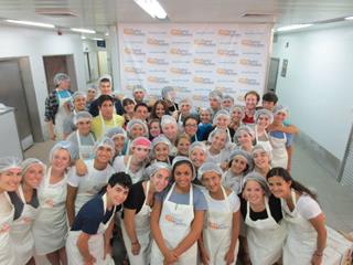 A group of youth from America enjoy an afternoon of chessed during their graduation school trip to Israel, Pantry Packers, Jerusalem